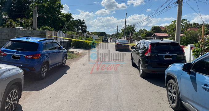 A police cordon at the home of Corporal Kamal Mayne on Claremont Drive, Old Harbour. (OH News Photo