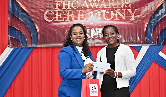 Director of FHC Credit Union and Board Secretary FHC Foundation Nickiesha Walsh (left) presented the Renald Mason Scholarship to Gayon Stewart at the awards ceremony. Stewart is pursuing a primary teacher education degree from St. Joseph Teachers’ College specialising in science and mathematics.