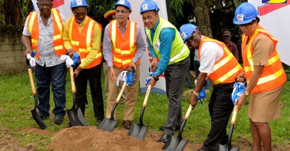 Minister of Health, Dr. the Hon. Christopher Tufton (third right), breaks ground for the $25-million Brown’s Hall Health Centre in St. Catherine on Wednesday (October 31). Others (from left) are Deputy Mayor of Spanish Town and Councillor for the Ginger Ridge Division, Ralston Wilson; Project Manager at the National Health Fund (NHF), Orette Clarke; Sales and Marketing Manager at Omni Industries Limited, Vincent Clarke; Chairman and Managing Director at Kemteck Development and Construction Limited, Sylvester Tulloch; and Senior Public Health Nurse at the South East Regional Helath Authority (SERHA), Marlene Stephenson.