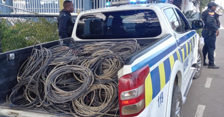 A police jeep with more than a tonne of stolen copper cables uncovered by the Old Harbour police today. (Contributed Photo)