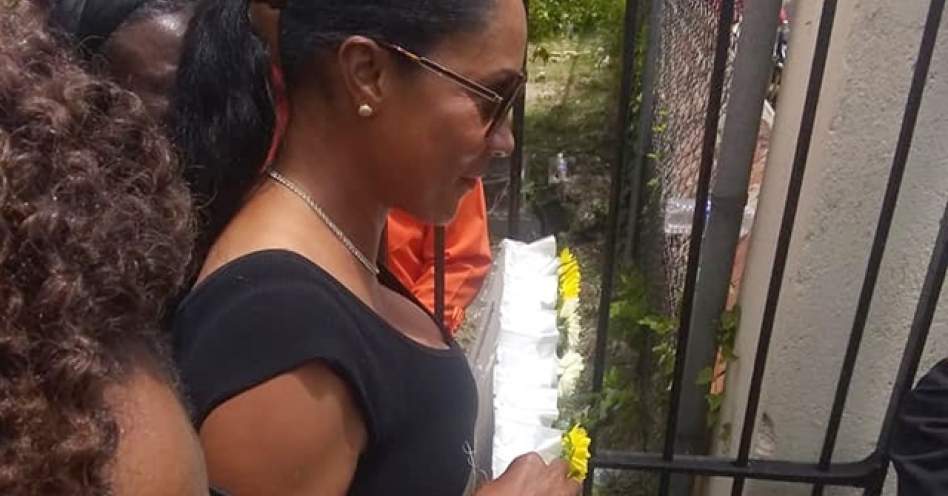 Dahlia Mears carrys a wreath at the funeral service of late husband Rudyard 'Kippy' Mears on April 27, 2019. (Photo Credit: facebook.com/dahlia.mears.16)