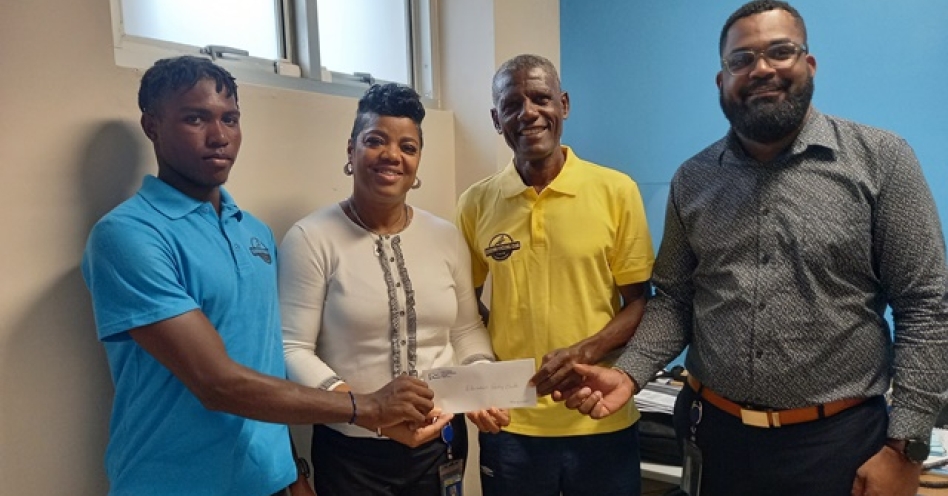 L-R: Jaequan Dixon, club member, Elevation Cycling Club; Shelly Allen, NCB Old Harbour branch manager; Alton Duhaney, vice president, Elevation Cycling Club; Ralston Taylor, NCB Old Harbour business banker. (OH News Photo)
