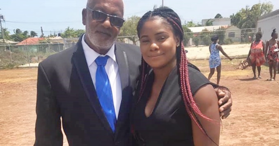 National athlete Gleneve Grange (right) shared this photo with dad Gladstone Grange, who was among four persons shot and killed by armed men in Dover district last night