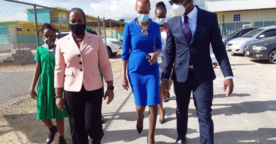 Minister of Education Fayval Williams (centre) in discussion with Calvin Harris (right), principal, Marlie Mount Primary and Infant School and Sophia Hall, Ministry of Education Regional Director, Region 6. (OH News Photo)