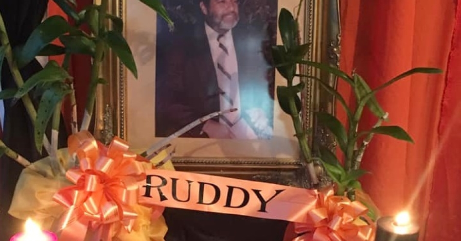 A condolence book was open during the candlelight vigil for the late former member of parliament Ruddy Lawson. (Photo: Contributed)