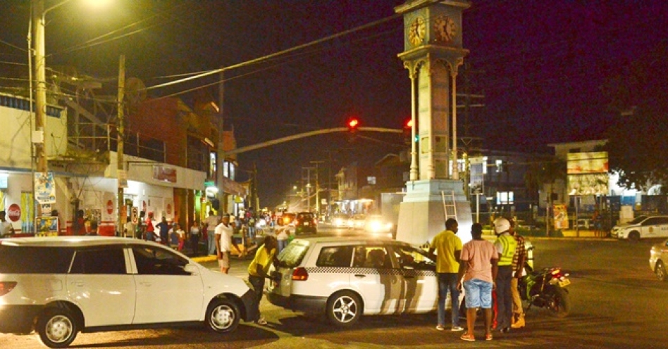 A motorist being stopped by a team from the Old Harbour police and Island Traffic Authority in Old Harbour Wednesday night. (Photo: Peter Simmonds)