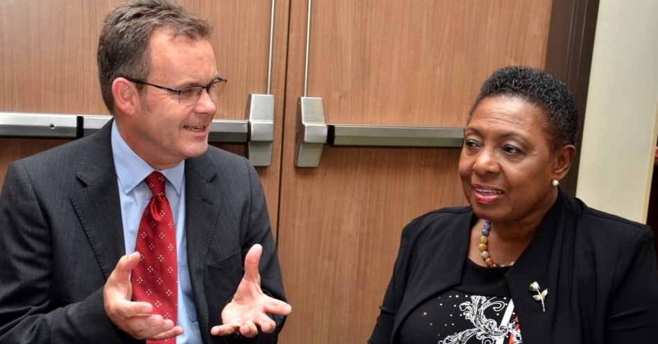 Minister of Culture, Gender, Entertainment and Sport, Hon. Olivia Grange (right), in conversation with Sport Consultant, Commonwealth Secretariat, Andy Preece, at a workshop on ‘Designing a Monitoring and Evaluation (M+E) Framework for Sport Development’, on Wednesday (September 25), at the Courtyard by Marriot Hotel, New Kingston. The two-day workshop will end on September 26. (JIS Photo)