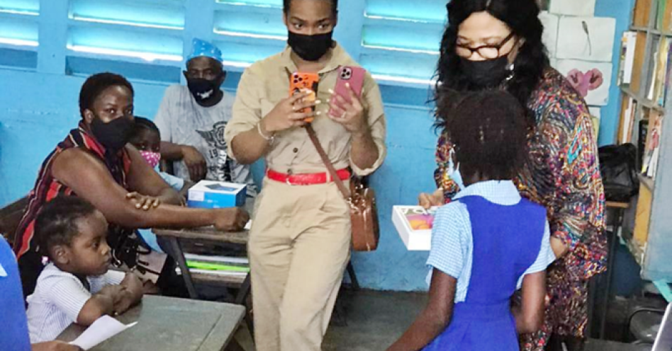Members from Spring Village Association diaspora donated 21 tablets to the Spring Gardens Association in January 2021. (Photo: Contributed)