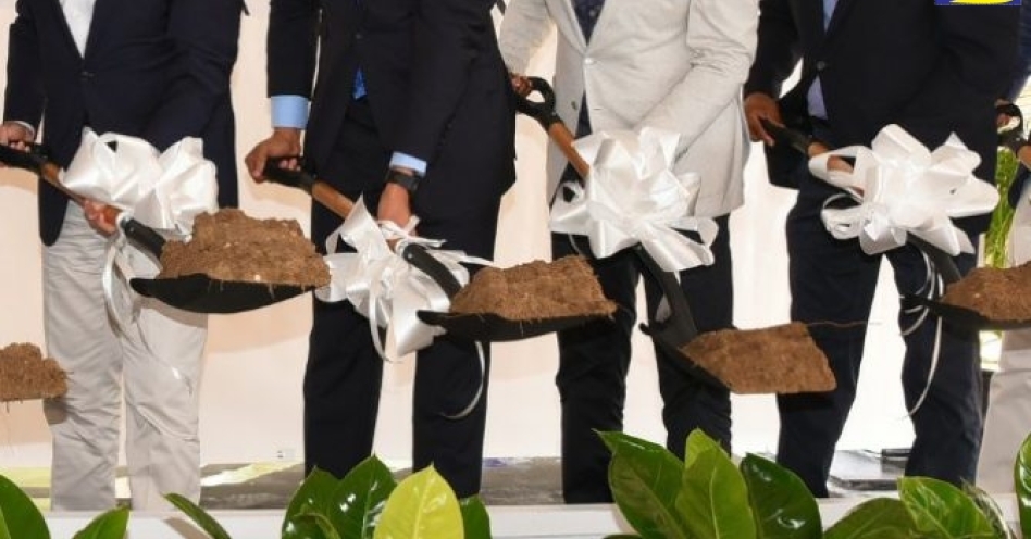 Prime Minister, the Most Hon. Andrew Holness (second left), breaks ground for a US$1 billion multi-resort development - Sugarcane Bay Jamaica - in Llandovery, St. Ann, on Friday, February 28. Also taking part (from left) are: Chief Sales and Marketing Officer at Karisma Hotels & Resorts, Armando Chomat; Minister of Tourism, Hon. Edmund Bartlett; and Mayor of St. Ann's Bay, Councillor Michael Belnavis. (JIS Photo)