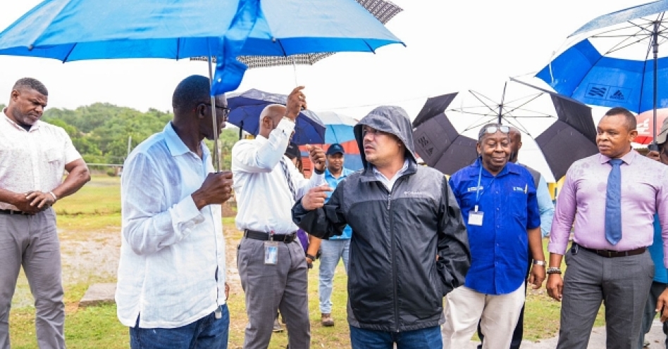 Minister without Portfolio in the Ministry of Economic Growth and Job Creation, Sen. the Hon. Matthew Samuda, speaks with Member of Parliament for South-West St. Catherine Hon. Clifford Warmington (left) during a tour of water systems in South-West St. Catherine.